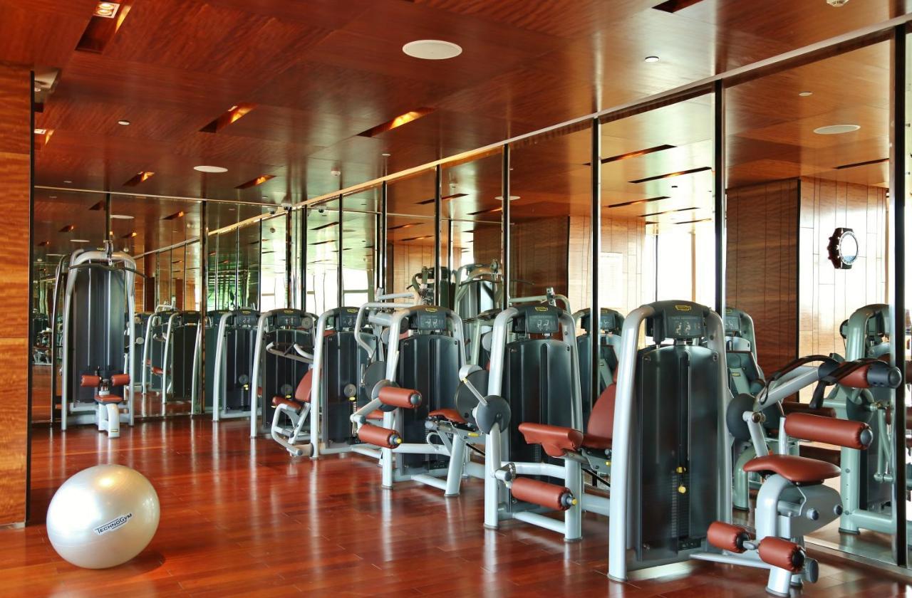 ทัช ซิตี้เซ็นเตอร์ - คุรุคราม Hotel คูร์เคาน์ ภายนอก รูปภาพ The gym at the Ritz-Carlton, Singapore